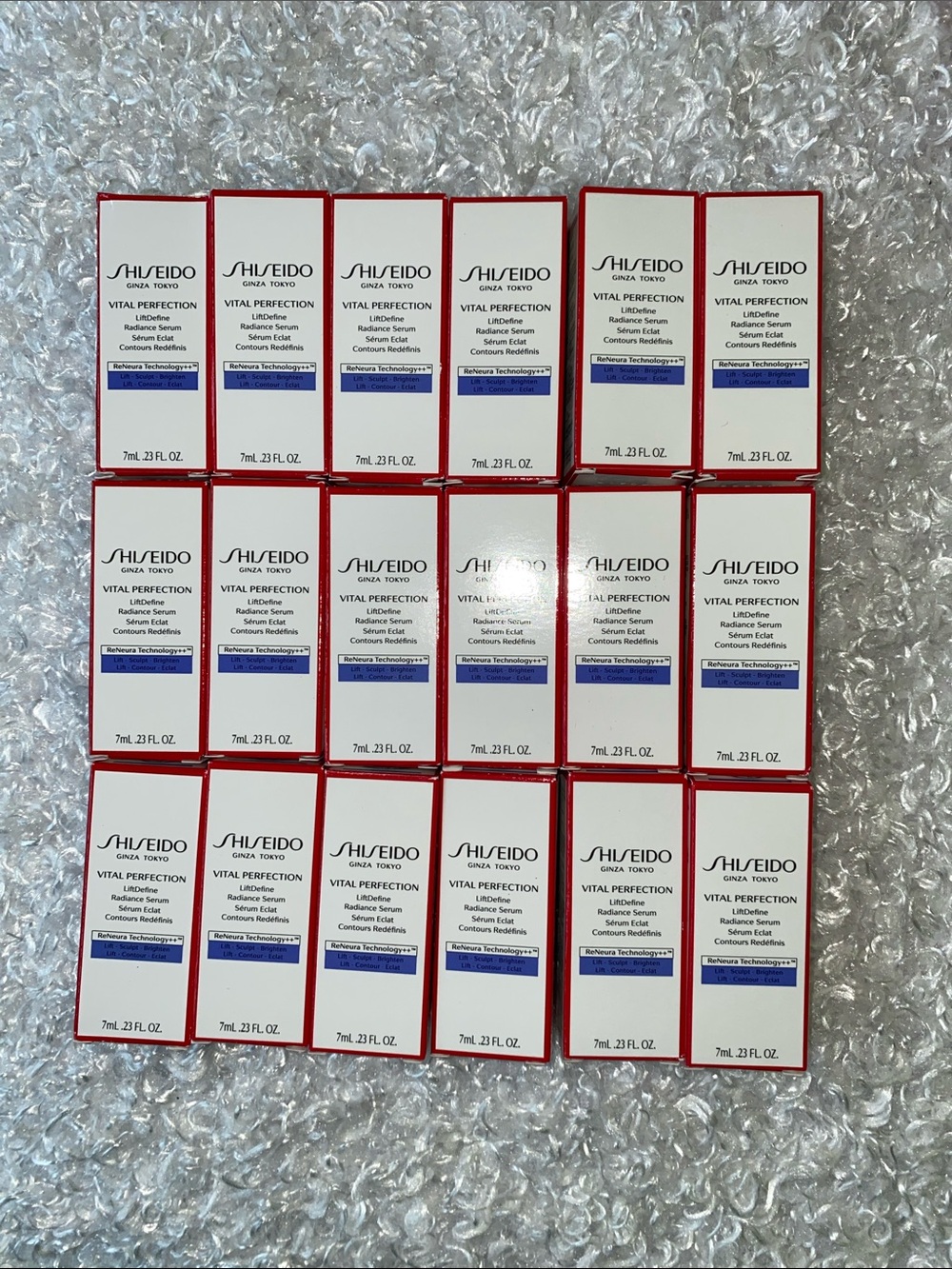 Shiseido Vital Perfection Serum Boxes - White, Red & Blue Accents